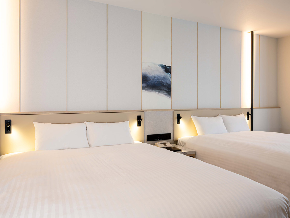 新客室エグゼクティブデラックスツインのベッド2台