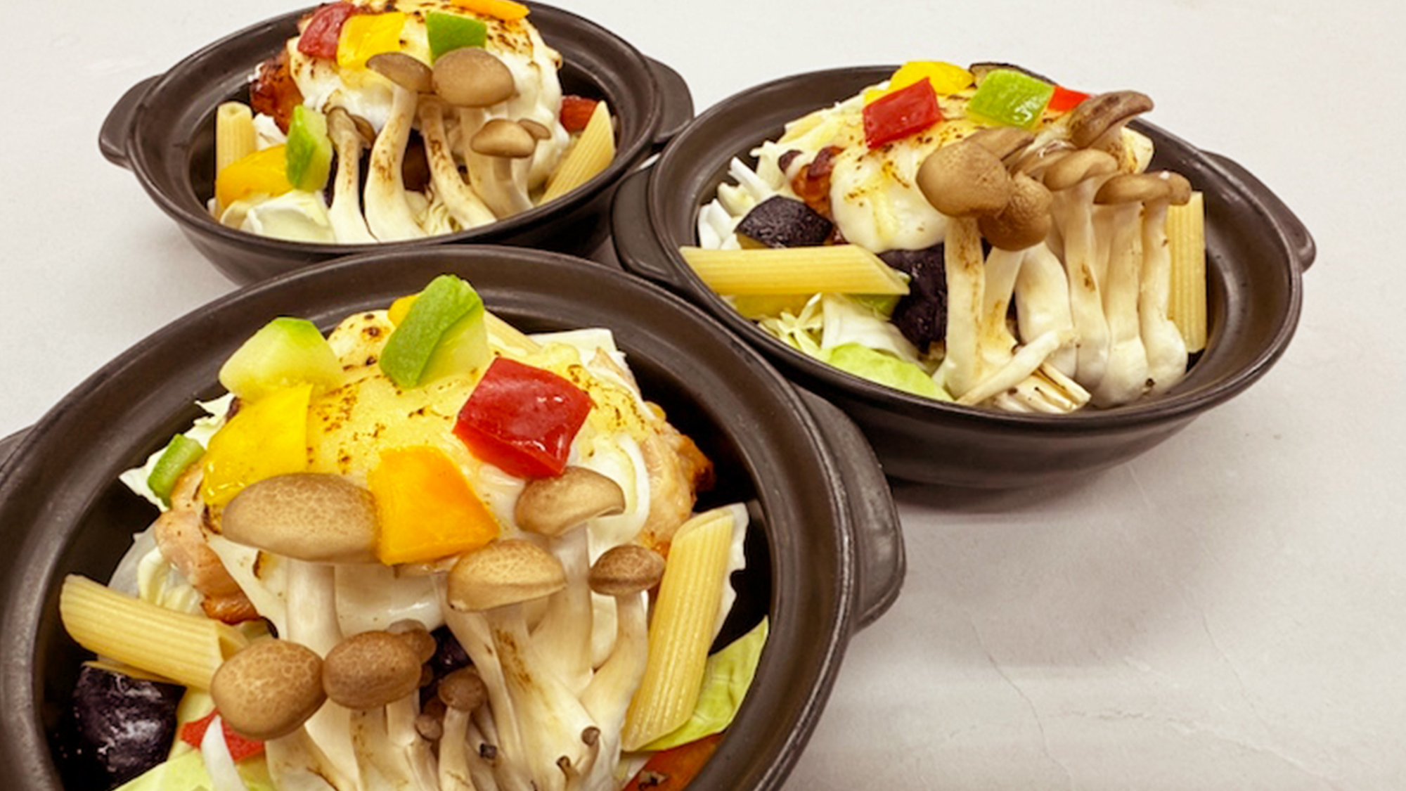 『きのこ』と若鶏ローストと浅利と茄子の胡麻醤油オイル蒸し焼き